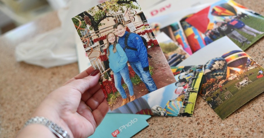 Woman holding Walgreens Photo Print