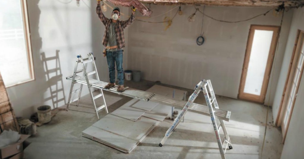 man standing on scaffolding on Werner Ladders