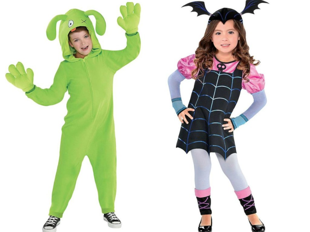 children wearing halloween costumes