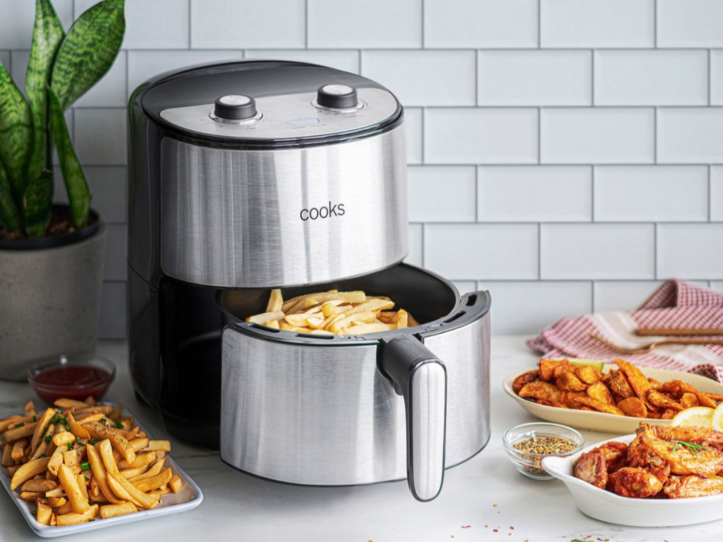 stainless steel cooks air fryer on kitchen counter with fries