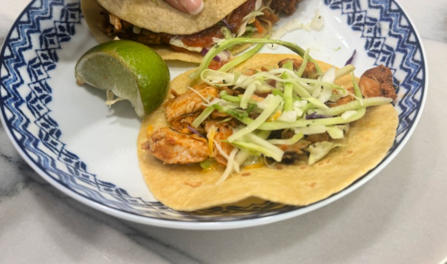 chicken taco on a plate from costco taco kit 