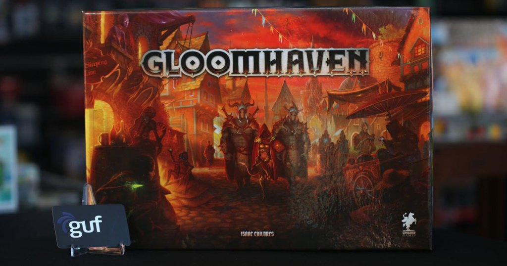 Gloomhave game on a table with a card set out