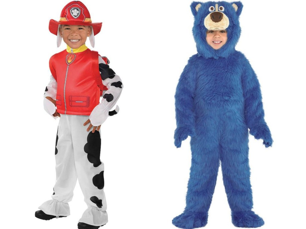 little boys wearing halloween costumes