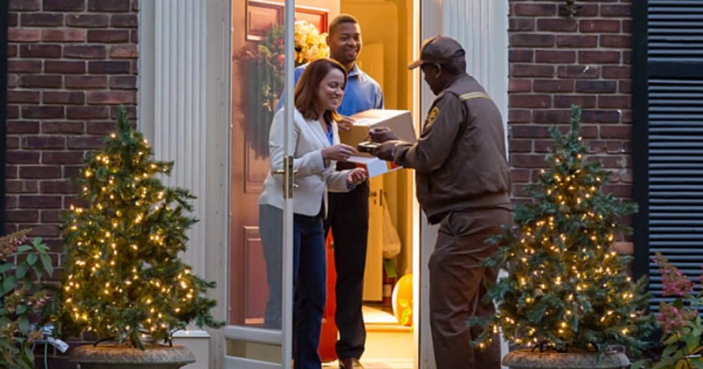 UPS delivering package to home at the holidays