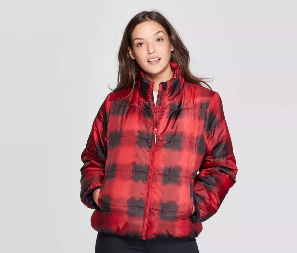 Woman wearing buffalo plaid puffer