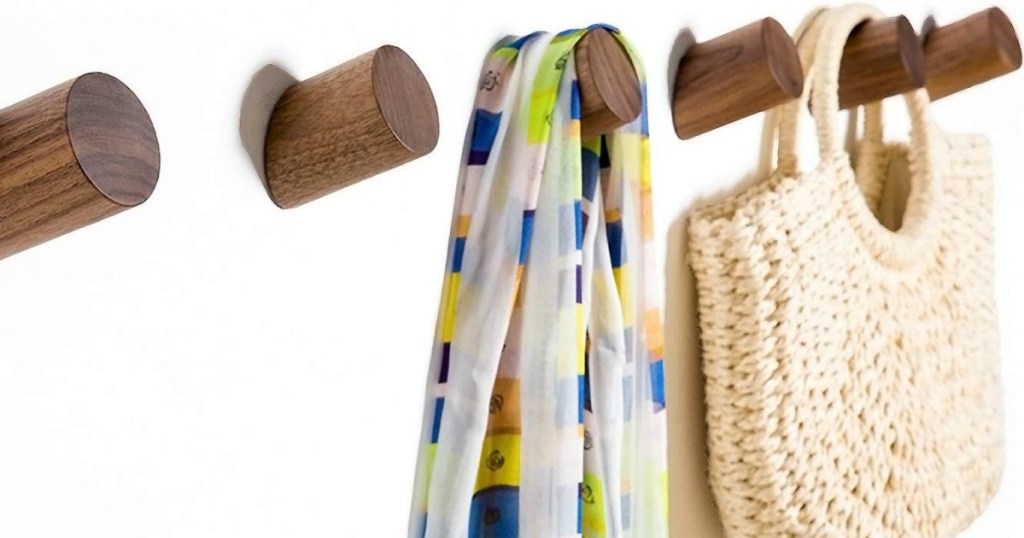 wood wall hooks with scarf and bag handing 