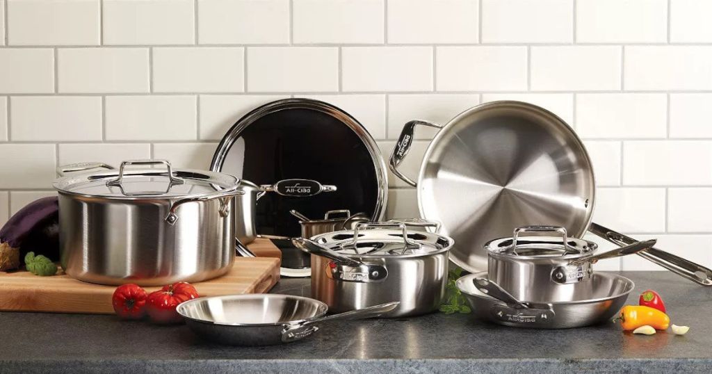 All-Clad D5 Stainless Brushed 10-Piece Cookware Set in kitchen with white subway titles