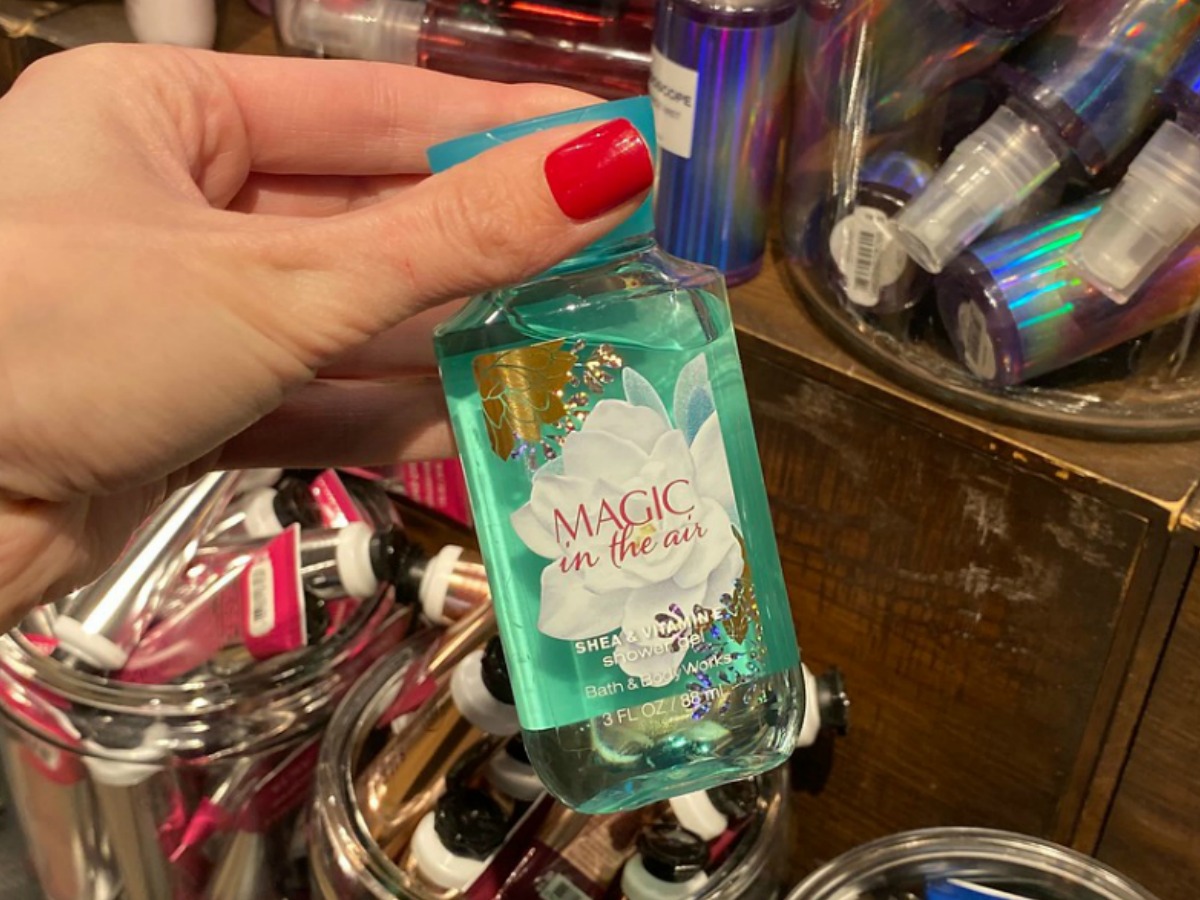 Bath & Body Works Shower Gel in hand near in-store display