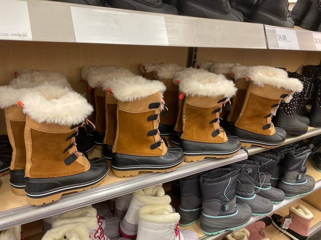 brown Cat & Jack Girls Constance Winter Boots on shelf at target