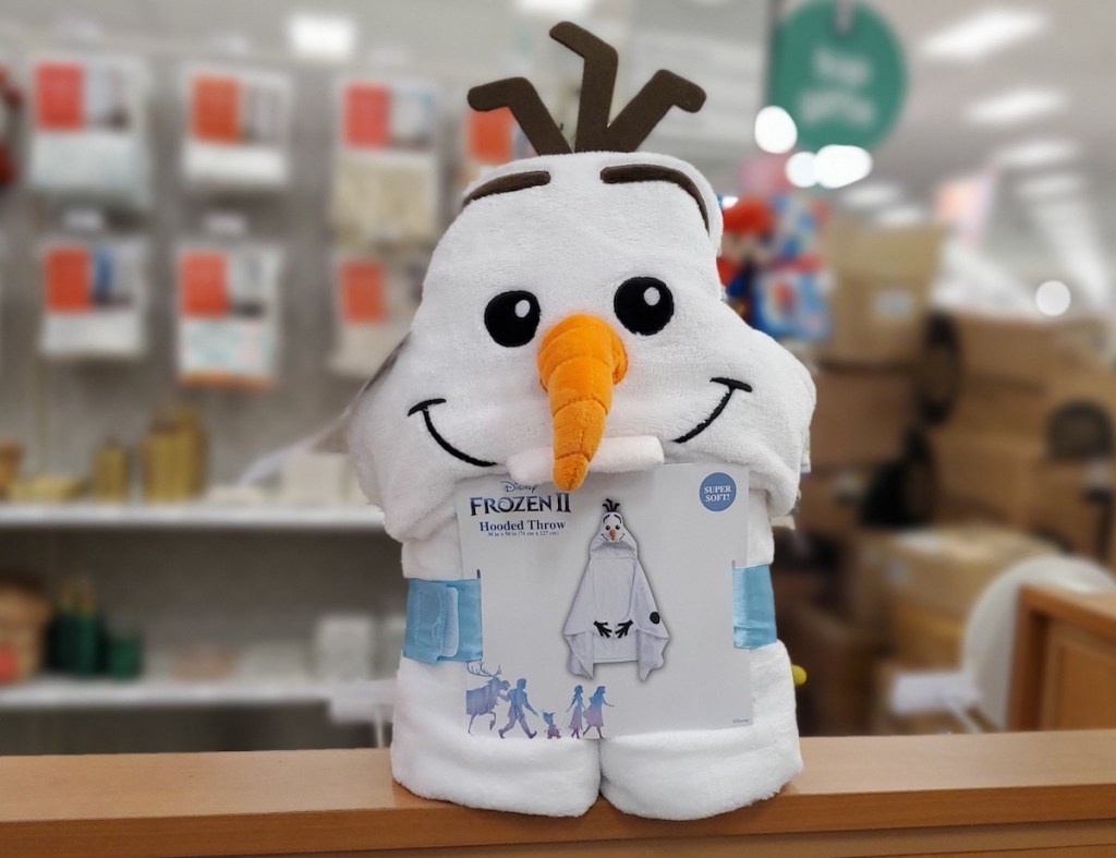 Disney Olaf Hooded Blanket on shelf at Target