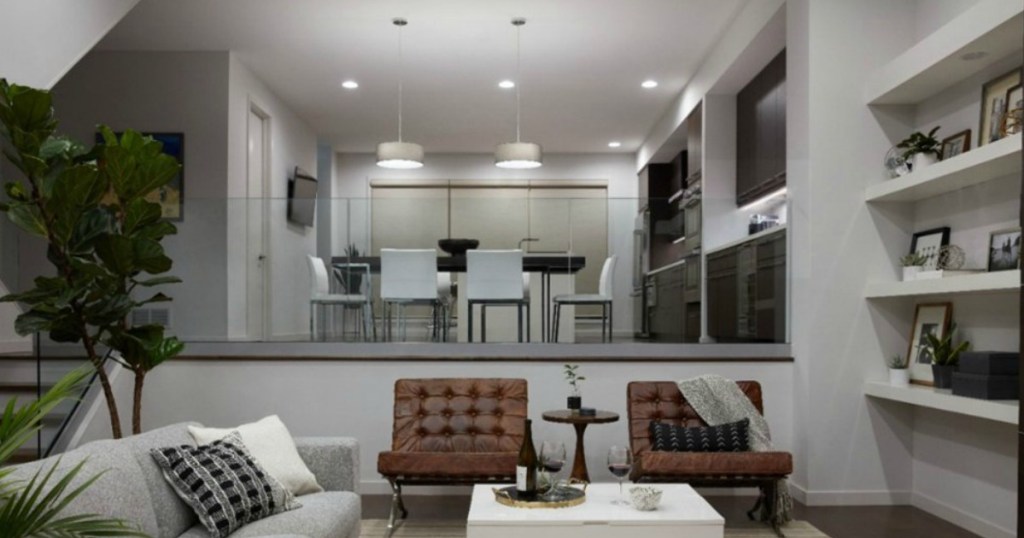 living room with furniture and bright lights