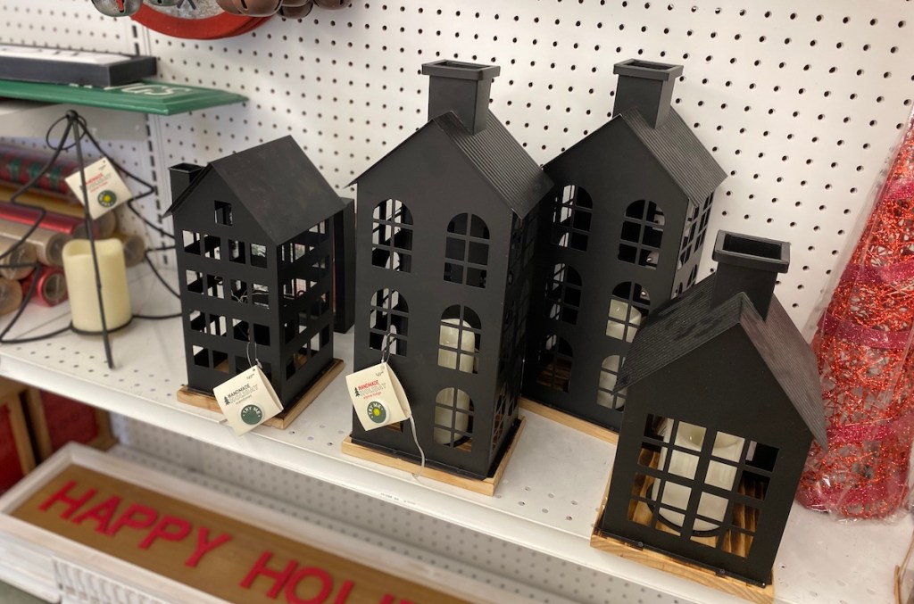 Handmade Holiday Metal Houses on shelves at Joann