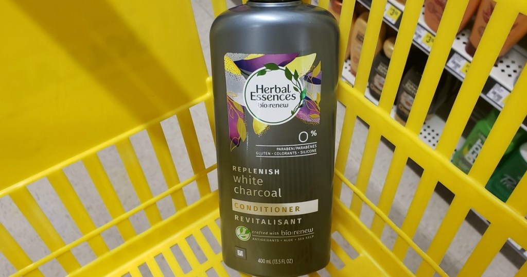 Herbal Essences White Charcoal conditioner bottle in a yellow shopping basket