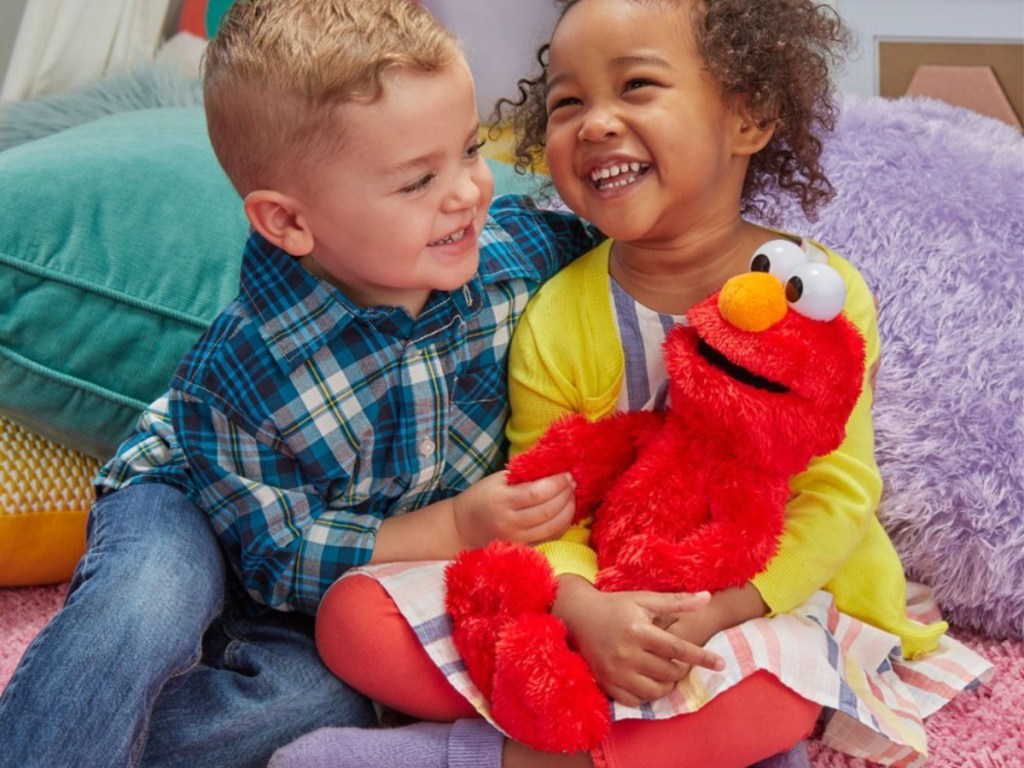 kids playing with elmo