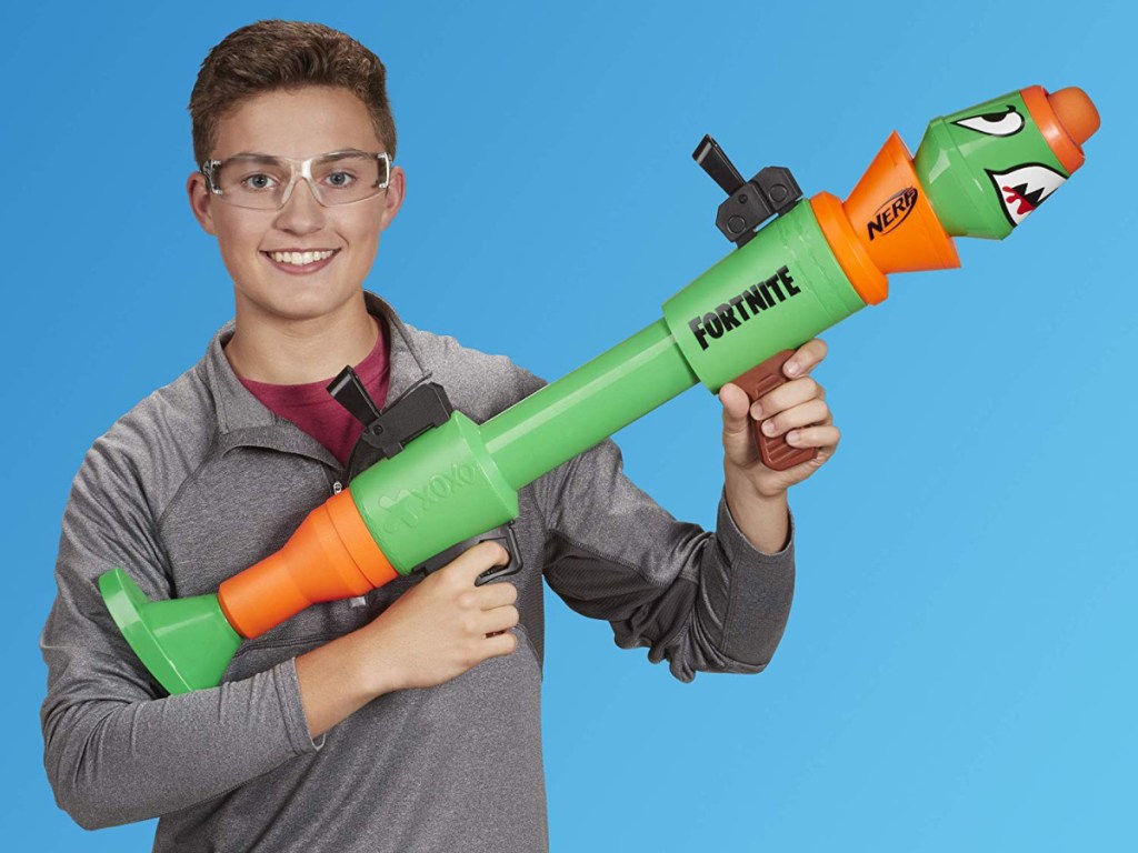 boy holding fortnite blaster