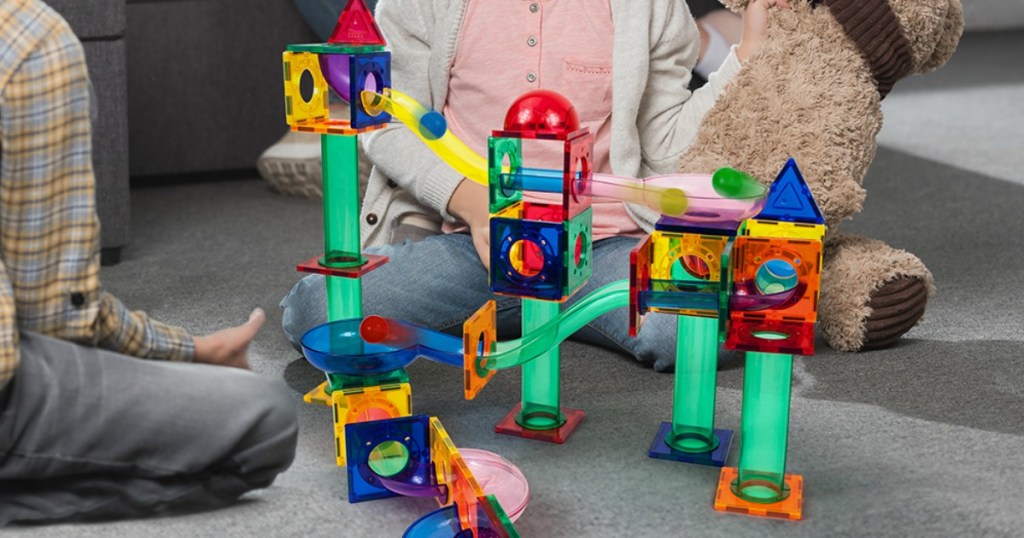 kids playing with PicassoTiles marble run