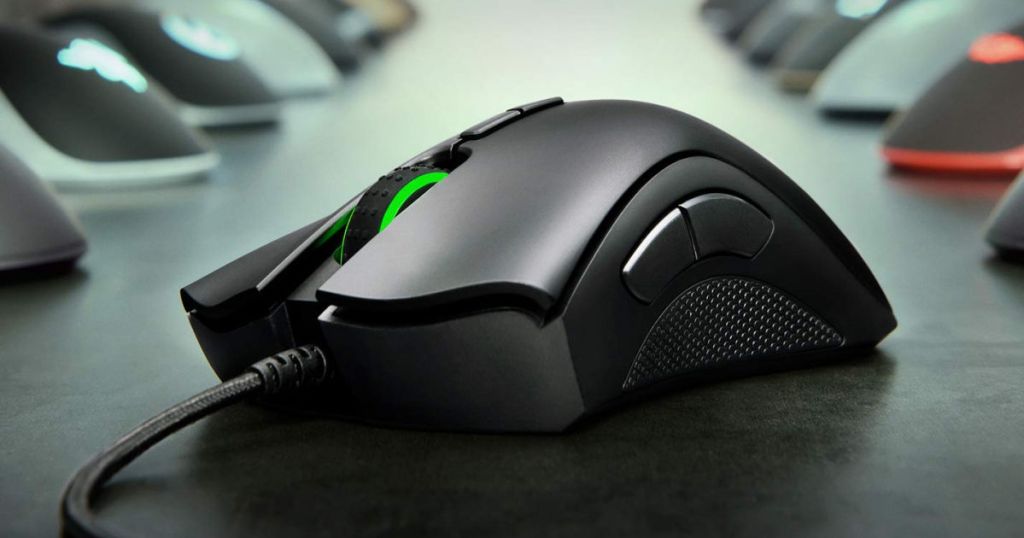 Razer DeathAdder Elite Gaming Mouse on table with other mouse in the background