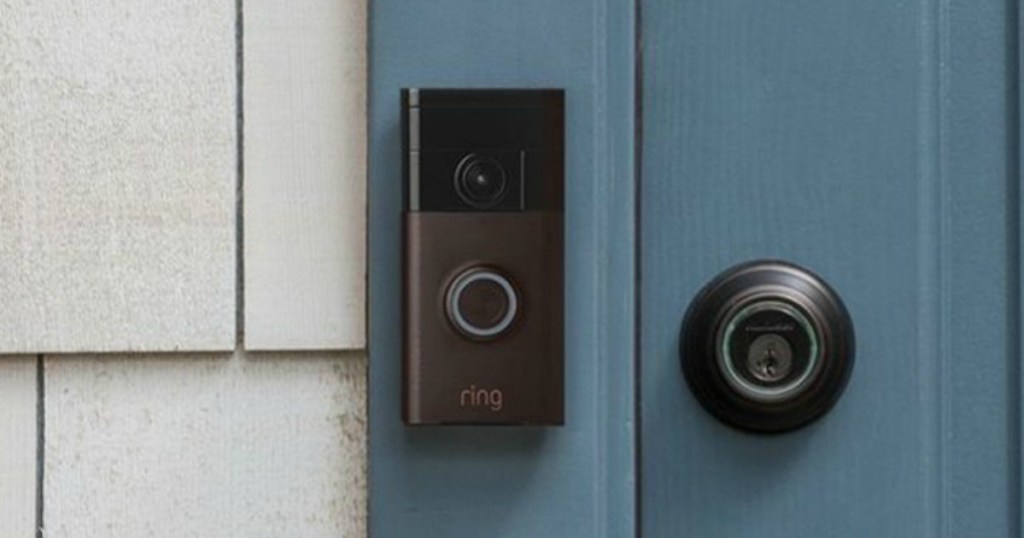 Ring video doorbell installed in blue doorway