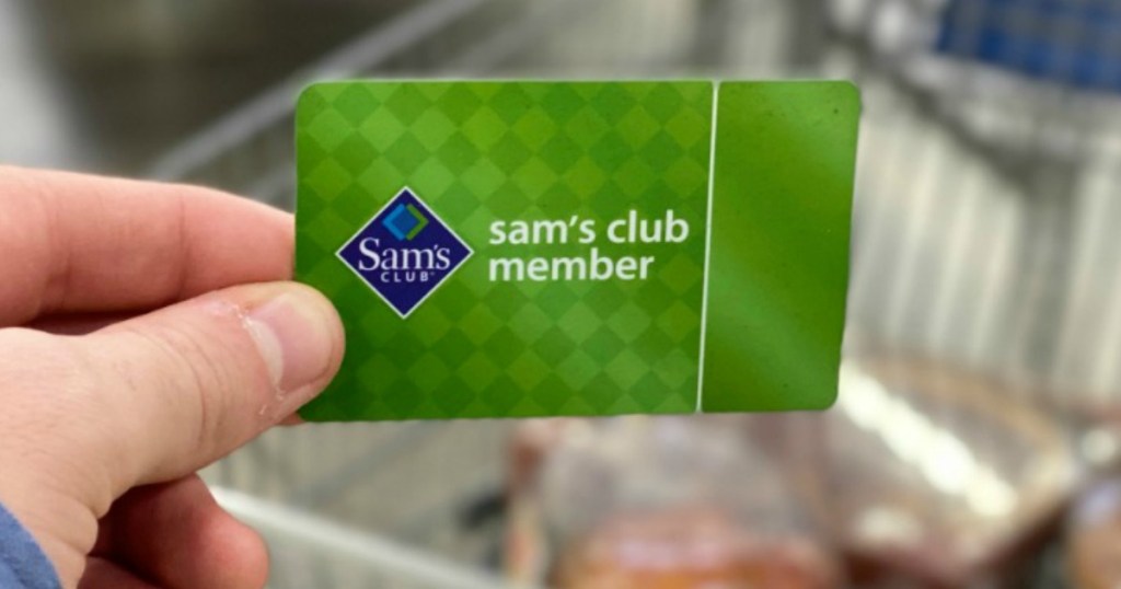 Man holding a Sam's Club Membership card