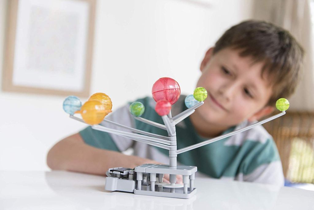 Boy with a Solar System Kit