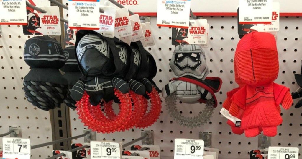 Star Wars Ring Toys hanging on pegs at Petco