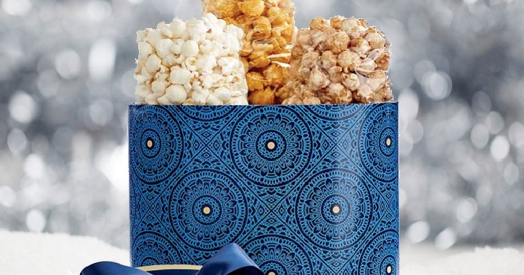 All Is Calm Sampler Popcorn Tin stock image with a pretty background