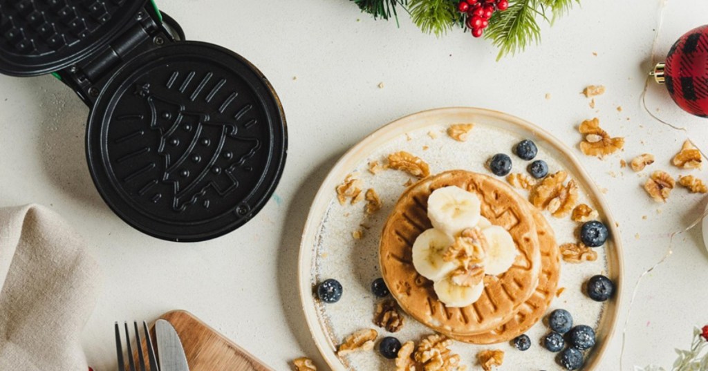 Mini waffles with Christmas tree designs and waffle iron