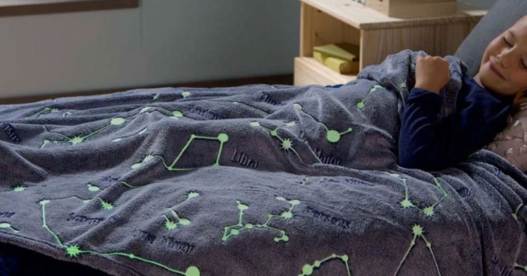 boy sleeping with zulily glow in the dark blanket stars