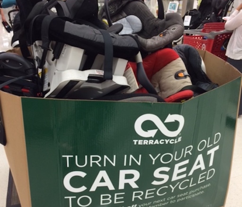 green terracycle box filled with used car seats