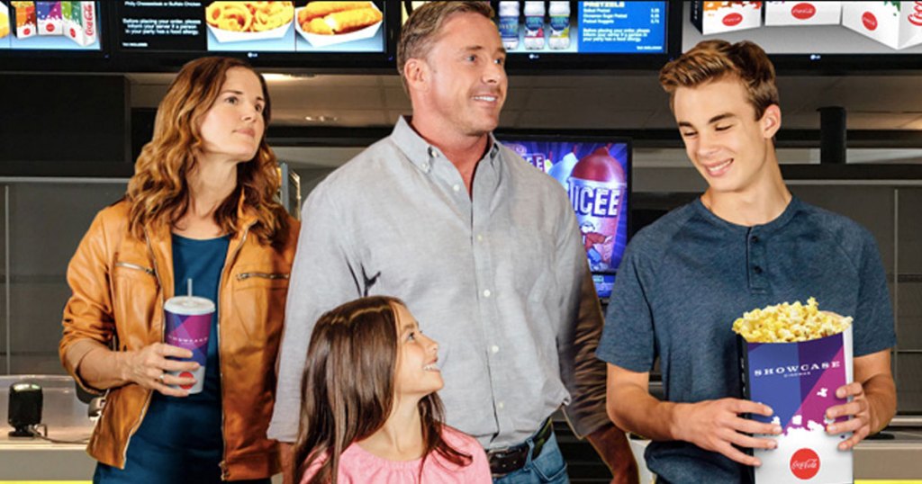 family at the movies buying snacks at the concessions