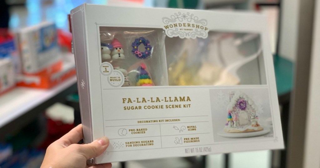 woman holding llama sugar cookie scene kit