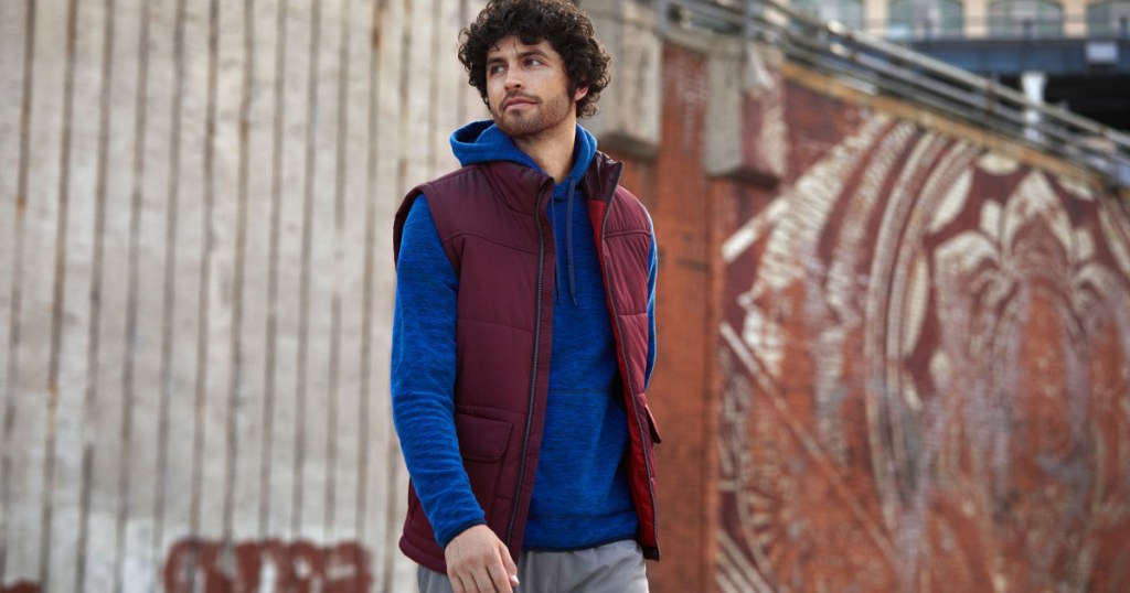 man wearing fleece hoodie and vest