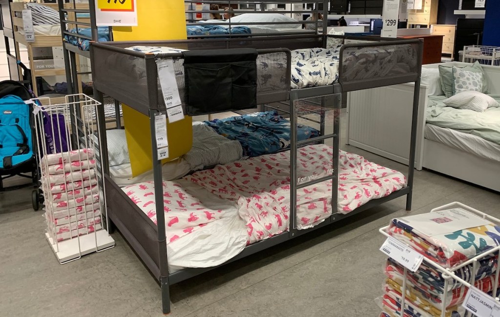 dark gray metal bunk bed sitting in ikea store