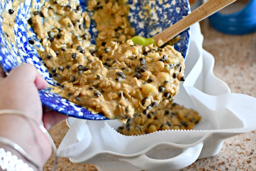 pouring oatmeal batter into baking pan