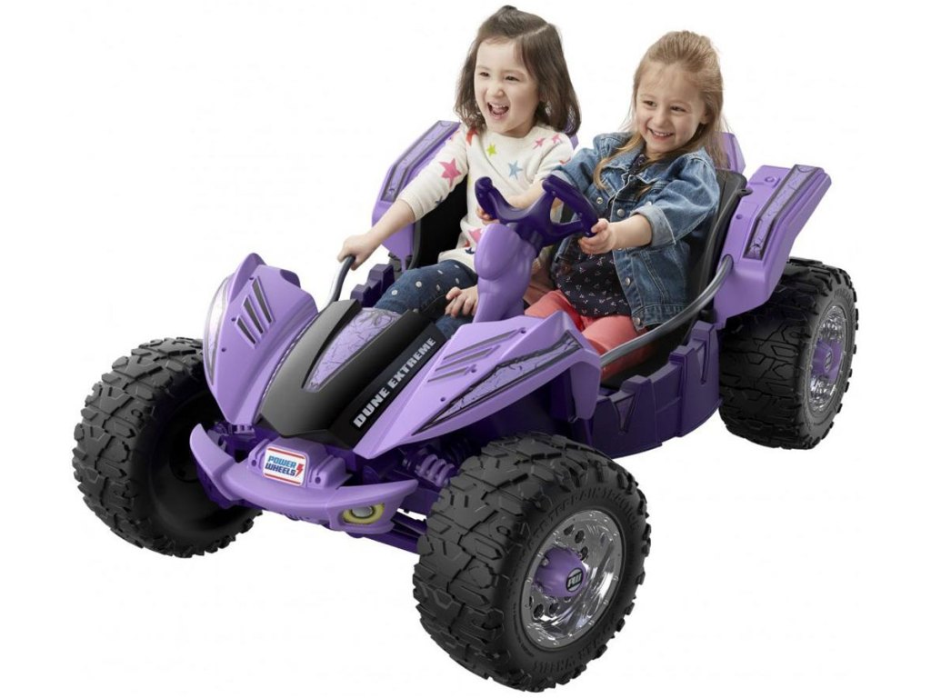 two girls riding Power wheels extreme ride on toy