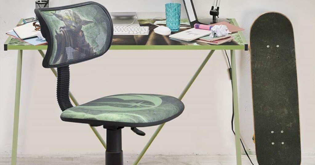 star wars desk and swivel chair with skateboard leaning on wall