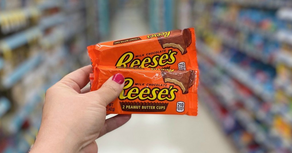 hand holding candy in a store