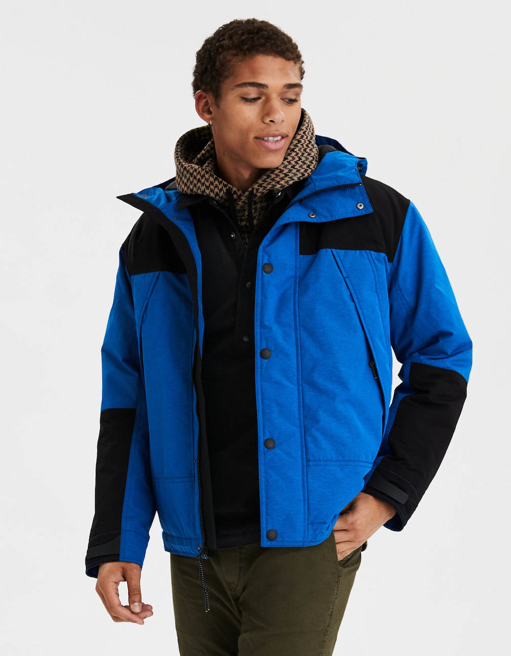 Man wearing blue AE All Weather Parka