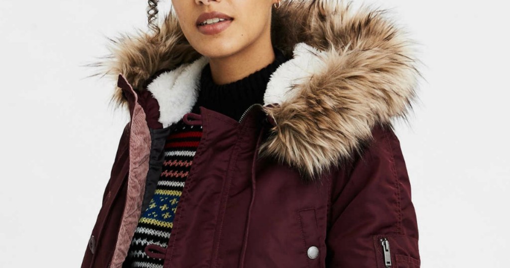 Woman wearing American Eagle Women's Parka in Burgundy