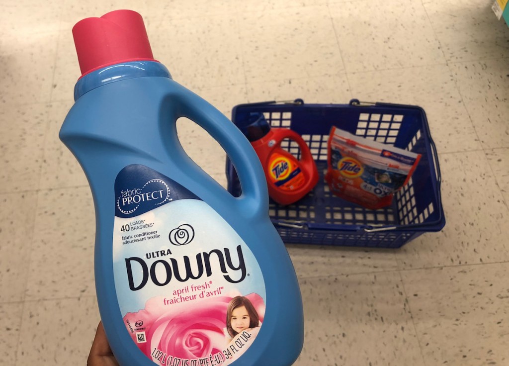 hand holding bottle of Downy Fabric Softener