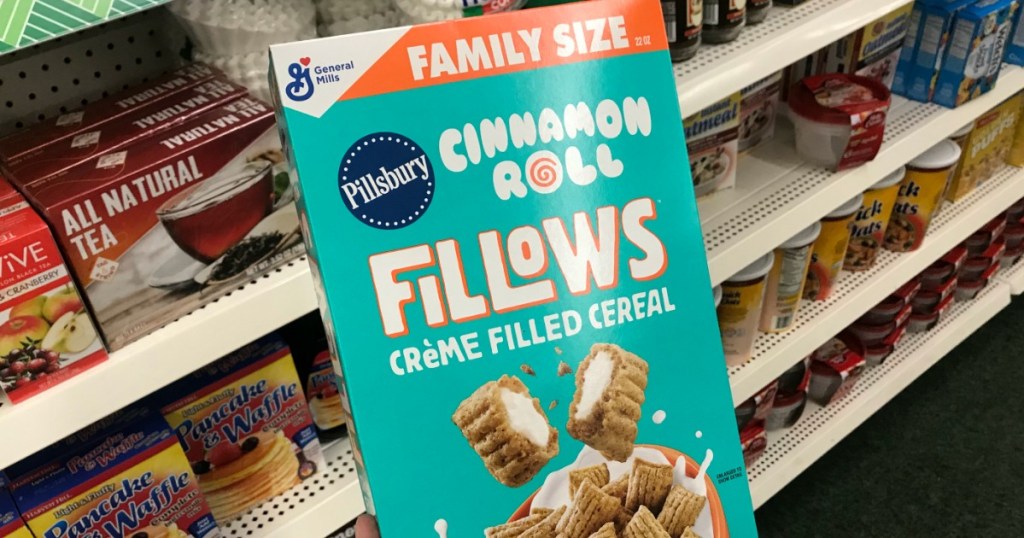 hand holding a box of Fillows cereal at Dollar Tree