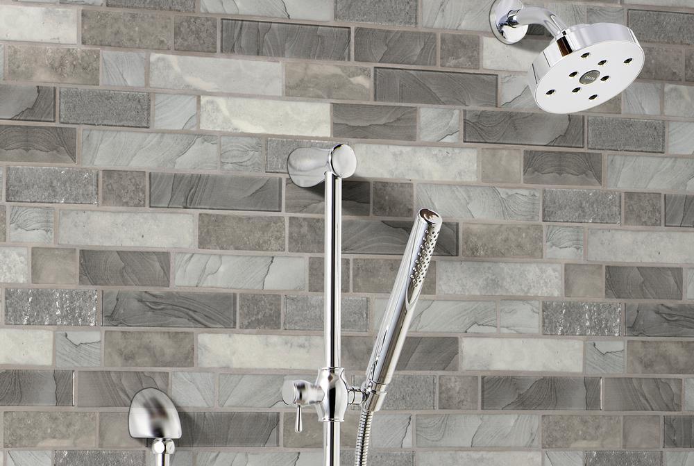 showerhead with tile behind it