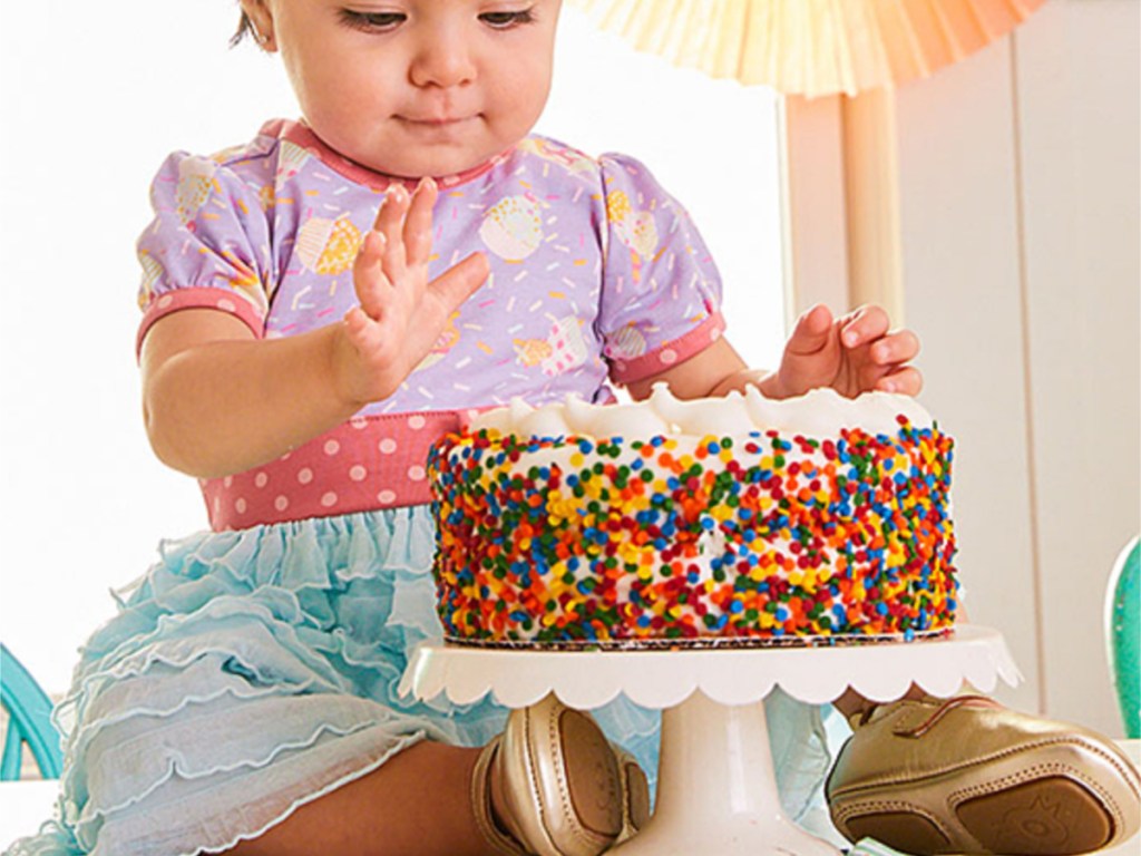 little Girl wearing Matilda Jane ruffle Dress