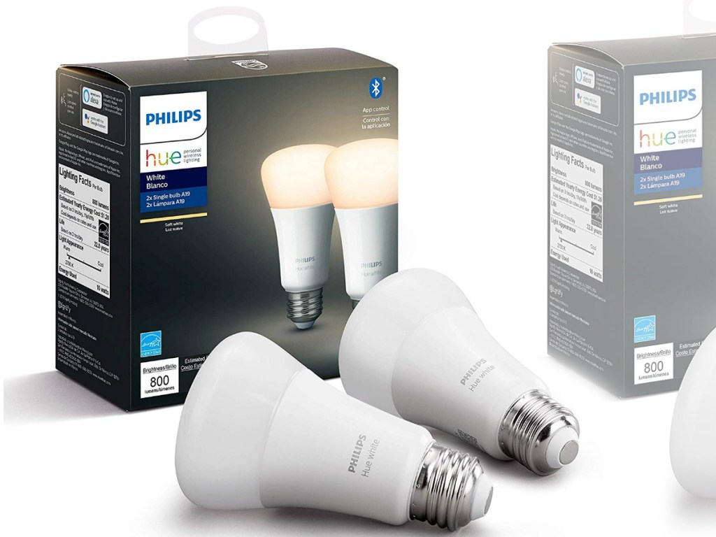 Two pack of smart lightbulbs on white table top with packaging