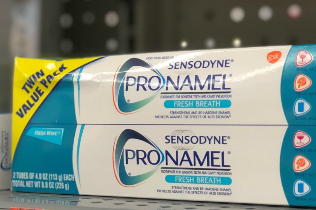 Sensodyne brand toothpaste on shelf in-store on display