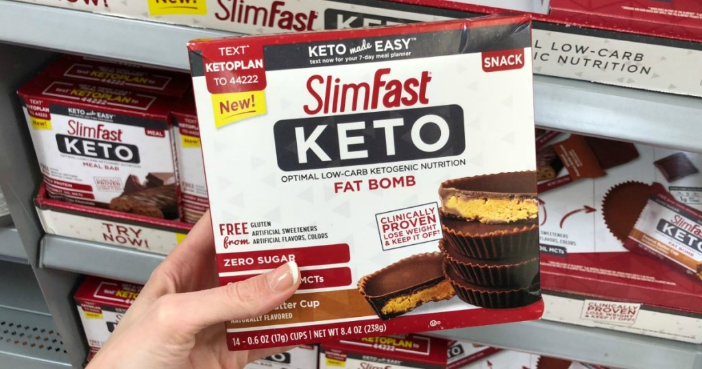 Box of SlimFast KETO Snacks in box in hand in-store