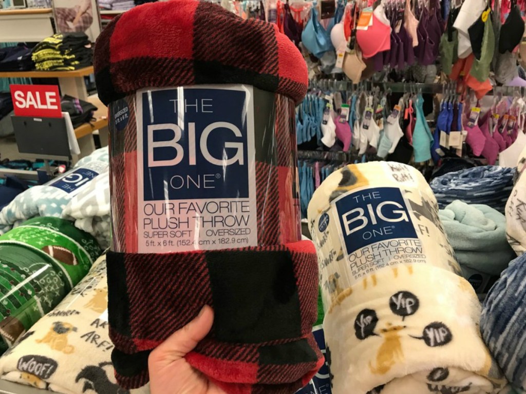 lady holding The Big One Plaid Plush Throw