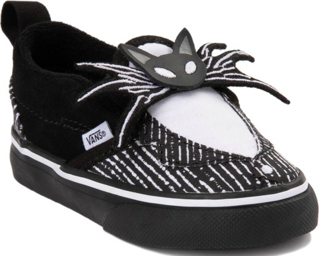 Slip on shoes in black and white skeleton theme