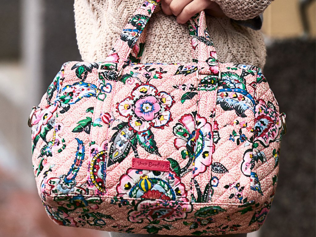 Vera Bradley 100 Handbag Stitched Flowers in woman's hand