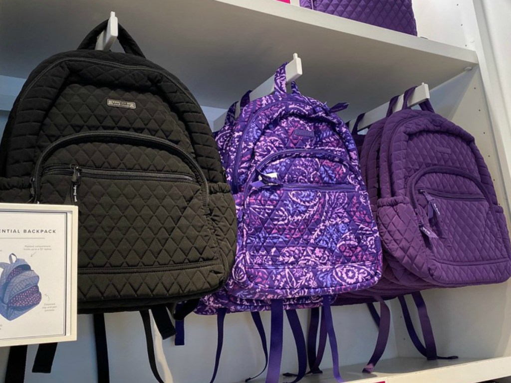 Vera Bradley backpacks hanging at the store